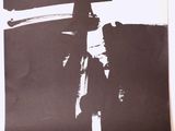 une image représentant une affiche de film sur laquelle figure un homme tenant une planche de surf
