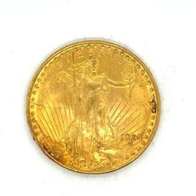 une image d'une pièce d'or sur une surface blanche