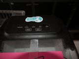 a close up of a printer with a sticker on it