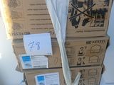 a stack of boxes sitting on top of a white table