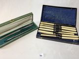 une boîte contenant un ensemble de couteaux et une boîte contenant un ensemble de couteaux