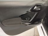 the door handle of a car with a remote control in it