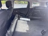 the back of a car with a bench in the back of it