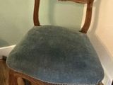 a chair that is sitting in the corner of a room