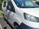 a white van that is parked in a parking lot