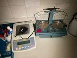 a photo of a scale on a counter with a measuring device