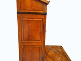 a wooden podium with a door on the top of it