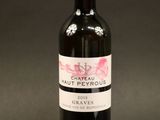 a bottle of wine that is sitting on a table