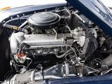a close up of an engine in a blue car