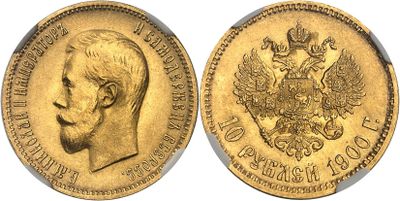 a close up of a gold coin with a man ' s face on it