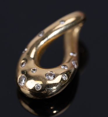FRED, pendentif "Mouvementé" en or jaune 750/1000e et diaman…