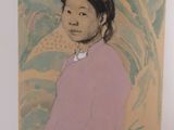 portrait of a woman in a pink sweater and hat
