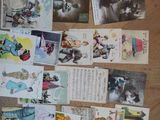 a lot of old postcards on the table