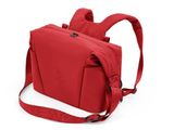 un sac à dos rouge muni d'une bandoulière, sur fond blanc