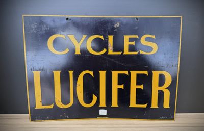 a black and yellow sign that says cycles luciferer