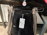 a rack with clothes on it in a clothing store