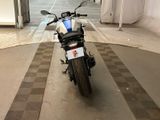 a motorcycle that is parked in a garage