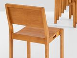 a lot of chairs that are lined up in a row