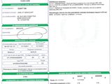 a green and white document with a barcode on it