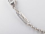 silver plated bracelet with a chain that has a clasp on it