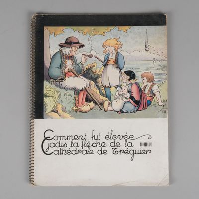 un livre sur lequel figure la photo d'une famille assise dans l'herbe