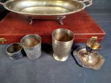 three cups and a tray sitting on a table