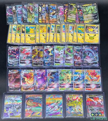 a large collection of pokemon cards are displayed on a table