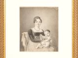 portrait of a woman holding a baby in her lap