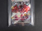 a close up of a card in a plastic case on a table