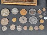 a picture of a collection of old coins on a table