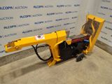 a close up of a machine that is sitting on the ground