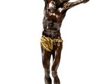 une image représentant la statue d'un homme sur une croix