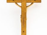 a wooden cross on a white background with a white background