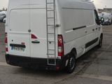 a white van that is parked in a parking lot
