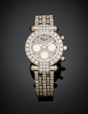 a diamond set chronograph wristwatch, by cartier