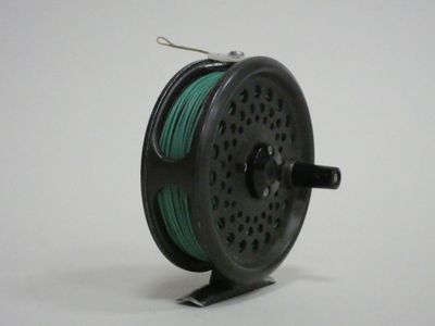 an image of a reel with a spool on a white background