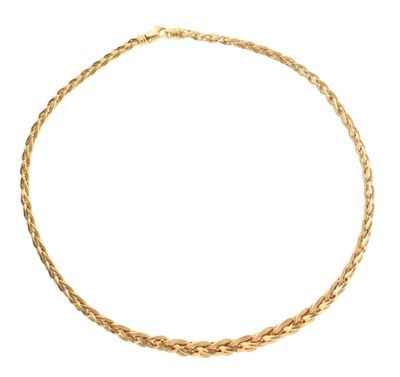 a gold necklace on a white background