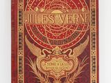un livre rouge orné de lettres dorées et d'un emblème doré