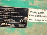 a label on the side of a machine that is sitting on the ground
