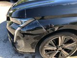 a close up of a car that has a denting on it