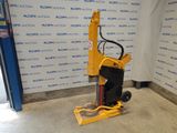an image of a machine that is sitting in front of a wall