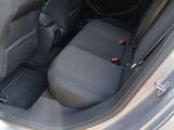 the back seats of a car with a seat belt in the back