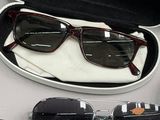 a pair of sunglasses sitting in a case on a table