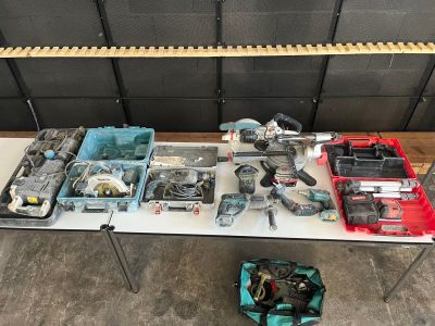 a table with tools on it in a garage