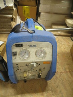 an image of a portable air compressor in a warehouse
