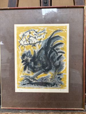tableau représentant un coq, encadré et posé sur un chevalet en bois