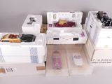 many boxes with different types of toy cars in them