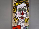 painting on the wall of a room with a painting of a man on a skateboard