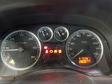a close up of a car dashboard with various gauges