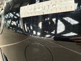 a sticker on the back of a car that says cutty